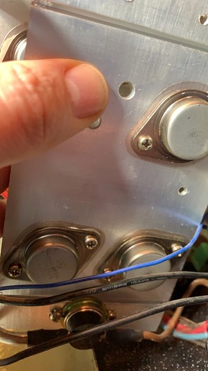 Three large transistors on a heat sink