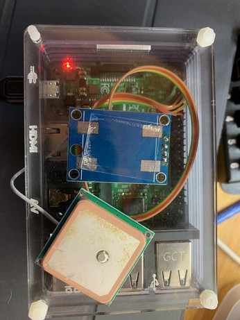 Raspberry Pi with a GPS in the case. 