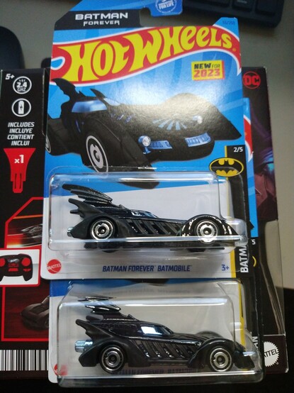 two Hot Wheels new for 2023 Batman Forever Batmobiles in retail package
