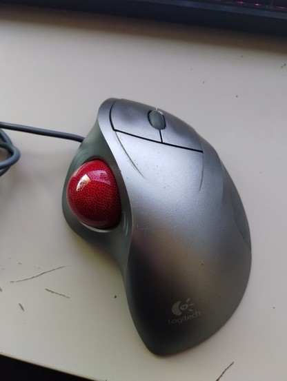 Gray logictech trackball mouse with scroll wheel 