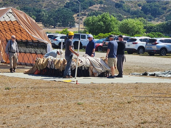 Collapsible Quonset-style tent being erected for #2025FieldDay by Conejo ValeyAmateurRadioClub