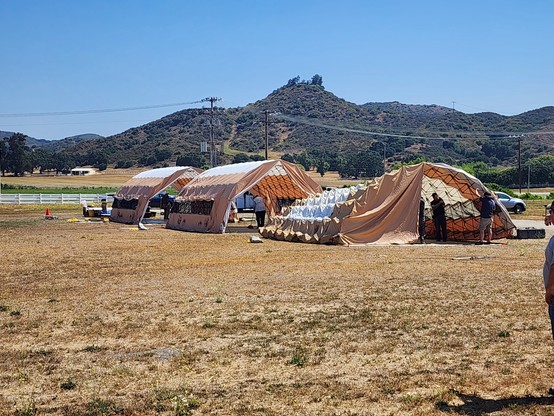 Collapsible Quonset-style tent being erected for #2025FieldDay by Conejo ValeyAmateurRadioClub