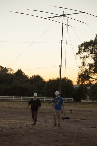 Antenna Mast at Field Day with workers in foreground, including W6KME and KC0MQE